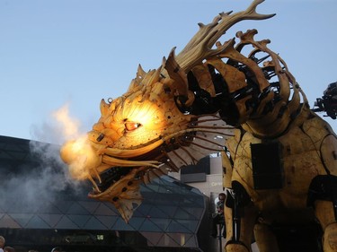 Kumo the spider and Long Ma the dragon horse battled beside the Shaw Centre in downtown Ottawa in an epic fight scene that left the thousands of spectators in awe Friday (July 28, 2017) night. La Machine's mechanical spectacle continues in Ottawa's streets Saturday and Sunday. Julie Oliver/Postmedia
Julie Oliver, Postmedia