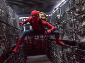 This image released by Columbia Pictures shows Tom Holland in a scene from &ampquot;Spider-Man: Homecoming.&ampquot; (Chuck Zlotnick/Columbia Pictures-Sony via AP)