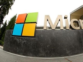 FILE - This July 3, 2014, file photo, shows the Microsoft Corp. logo outside the Microsoft Visitor Center in Redmond, Wash. On the surface, the investigation was routine. Federal agents persuaded a judge to issue a warrant for a Microsoft email account they suspected was used for drug trafficking. But U.S.-based Microsoft kept the emails on a server in Ireland. Microsoft said that meant they were beyond the warrant‚Äôs reach and a federal appeals court agreed. In June 2017, the Trump Administrat