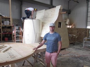 Former landscaper Tyson Leavitt launched Charmed Playhouses two years ago after noticing countless houses with big, beautiful yards geared to adults while the kids had to settle for a rickety swingset. Leavitt is seen inside his workshop in Lethbridge, Alta., on June 27, 2017. THE CANADIAN PRESS/Bill Graveland