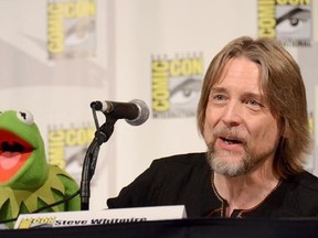 FILE - In this July 11, 2015, file photo, Kermit the Frog, left, and puppeteer Steve Whitmire attend &ampquot;The Muppets&ampquot; panel on day 3 of Comic-Con International in San Diego. ABC News and The Hollywood Reporter reported July 10, 2017, that Whitmire is no longer performing the character. (Photo by Tonya Wise/Invision/AP, File)