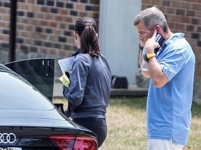 Former Anheuser-Busch CEO August Busch IV exits the Swansea, Ill., police station to a waiting car Tuesday, July 11, 2017. Busch is under investigation for appearing ‚Äútoo intoxicated to take off‚Äù hours after a helicopter landed in an office park near St. Louis. Police on Tuesday did not name Busch as the pilot, but he is identified in a search warrant application. (Derik Holtmann/Belleville News-Democrat via AP)