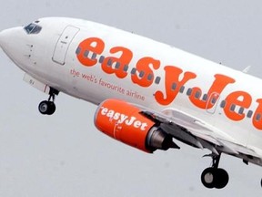 FILE- An easyJet aircraft takes off from Ciampino airport in Rome, Italy, in this Aug. 30, 2004, file photo. London-based budget airline EasyJet has announced it is opening a base in Vienna in anticipation of Brexit. EasyJet, which runs budget flights throughout Europe, said in a statement Friday July 14, 2017 that it will open a European Union base in Austria‚Äôs capital ‚Äúregardless of the outcome of talks on a future UK-EU aviation agreement.‚Äù (AP Photo/Corrado Giambalvo/File)