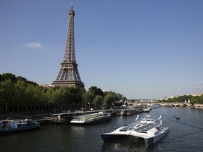 Eiffel Tower on the Seine river in Paris.
