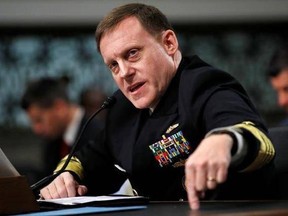 FILE - In this May 9, 2017, file photo, U.S. Cyber Command and the National Security Agency Director Adm. Mike Rogers testifies on Capitol Hill in Washington. U.S. officials say the Trump administration, after months of delay, is finalizing plans to revamp the nation&#039;s military command for defensive and offensive cyber-operations. The plan would eventually split it from the intelligence-focused National Security Agency in hopes of intensifying America&#039;s ability to wage cyber war against the Isla