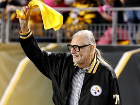 FILE - In this Oct. 1, 2015, file photo, horror film director George Romero, who directed &ampquot;The Night of The Living Dead&ampquot; waves a Terrible Towel before an NFL football game between the Pittsburgh Steelers and the Baltimore Ravens in Pittsburgh. It was the anniversary of the film that was made in the Pittsburgh area. Romero, whose classic &ampquot;Night of the Living Dead&ampquot; and other horror films turned zombie movies into social commentaries and who saw his flesh-devouring undead spawn countless imitators,