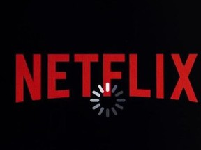 he Netflix logo is displayed on an iPhone in Philadelphia, Monday, July 17, 2017. Netflix‚Äôs shows are pulling in new viewers and award nominations in droves, but the online video service is burning cash at a furious pace to support production. Netflix, Inc. reports financial results, Monday, July 17, 2017.
