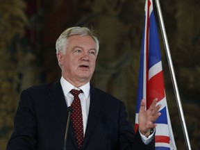 British Secretary of State for Exiting the EU David Davis addresses the media during a press conference.