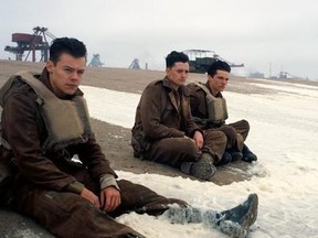 This image released by Warner Bros. Pictures shows Harry Styles, from left, Aneurin Barnard and Fionn Whitehead in a scene from 'Dunkirk.'