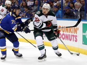 FIE- In this April 16, 2017, file photo, Minnesota Wild&#039;s Nino Niederreiter, of Switzerland, right, looks to pass as St. Louis Blues&#039; Vladimir Sobotka, left, of the Czech Republic, defends during the first period in Game 3 of an NHL hockey first-round playoff series in St. Louis. The Wild announced Sunday, July 30, announced that they have agreed to terms with Niederreiter on a five-year, $26.25 million contract. (AP Photo/Jeff Roberson, File)