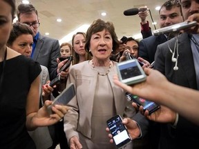 FILE - In this Tuesday, July 25, 2017, photo, Sen. Susan Collins, R-Maine is surrounded by reporters as she arrives on Capitol Hill in Washington, before a test vote on the Republican health care bill. Collins, who was one of three Republican senators voting against the GOP health bill on Friday, July 28, said she&#039;s troubled by Trump&#039;s suggestions that the insurance payments are a &ampquot;bailout.&ampquot; (AP Photo/J. Scott Applewhite, File)