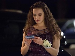 FILE - This file image released by Netflix shows Katherine Langford as Hannah Baker in a scene from the series, &ampquot;13 Reasons Why.&ampquot; The popular TV series about Baker&#039;s suicide that showed her ending her life may have prompted a surge in online searches for suicide, including how to do it, according to a new study published Monday, July 31, 2017, in JAMA Internal Medicine. (Beth Dubber/Netflix via AP, File)