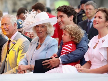 Prince Charles, Prince of Wales, Camilla, Duchess of Cornwall, Justin Trudeau, Hadrien Trudeau and Sophie Grégoire Trudeau watch Canada Day celebrations on Parliament Hill during a 3 day official visit to Canada on July 1, 2017 in Ottawa.