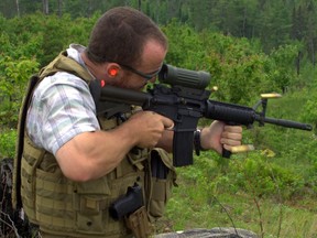 Adam Day is shown here in this 2012 photo taking part in small arms training while on assignment at CFB Petawawa.