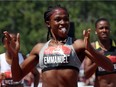 Crystal Emmanuel celebrates as she wins gold in the women's 200 metres at the Terry Fox Athletic Centre on Sunday. THE CANADIAN PRESS/Fred Chartrand