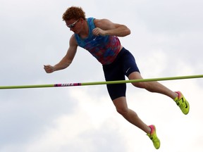 Toronto's Shawn Barber clears the bar on the way to victory in men's pole vault competition in the Canadian Track and Field Championships in Ottawa on Sunday. THE CANADIAN PRESS/Fred Chartrand