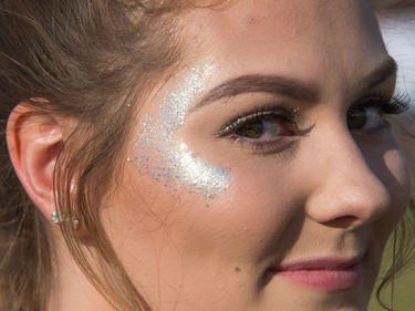 Heather Mackie, 17, has her glitter on for the artist Migos as day seven of the RBC Bluesfest takes place on the grounds of the Canadian War Museum.