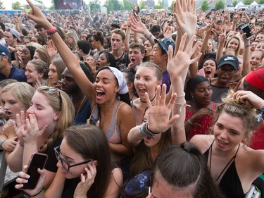 Fans of rapper Fetty Wap cheer as day five of the RBC Bluesfest takes place on the grounds of the Canadian War Museum.
