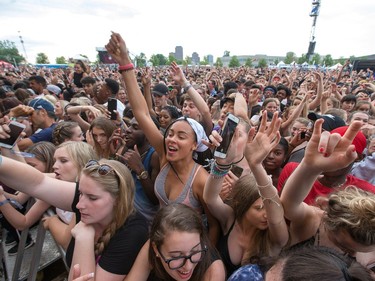 Fans of rapper Fetty Wap cheer as day five of the RBC Bluesfest takes place on the grounds of the Canadian War Museum.