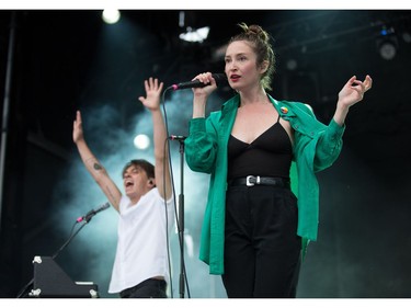 Singers Leah Fay and Peter Dreimanis of the band July Talk on stage as day five of the RBC Bluesfest takes place on the grounds of the Canadian War Museum. Wayne Cuddington/Postmedia