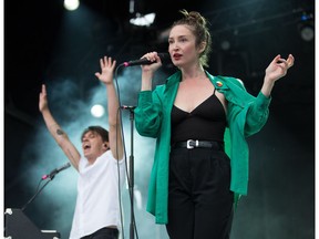 Singers Leah Fay and Peter Dreimanis of the band July Talk on stage as day five of the RBC Bluesfest takes place on the grounds of the Canadian War Museum.