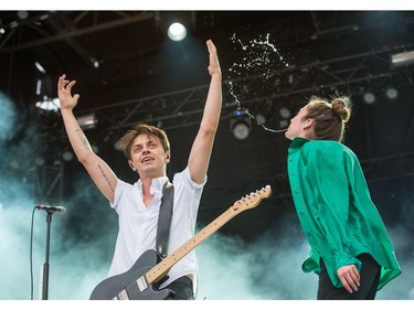 Singers Leah Fay and Peter Dreimanis of the band July Talk on stage as day five of the RBC Bluesfest takes place on the grounds of the Canadian War Museum. Wayne Cuddington/Postmedia