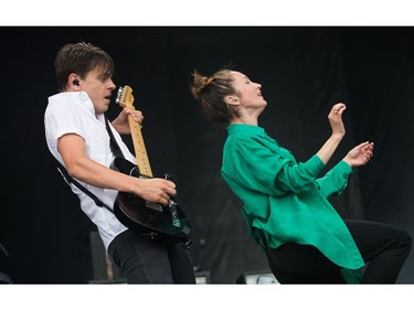 Singers Leah Fay and Peter Dreimanis of the band July Talk on stage as day five of the RBC Bluesfest takes place on the grounds of the Canadian War Museum.  Wayne Cuddington/Postmedia