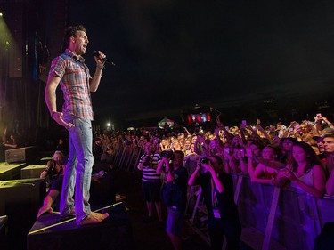 Jake Owen on stage as day five of the RBC Bluesfest takes place on the grounds of the Canadian War Museum.