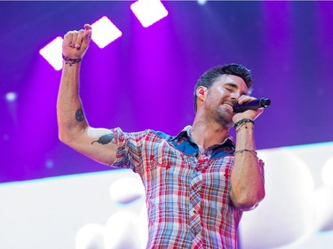 Jake Owen on stage as day five of the RBC Bluesfest takes place on the grounds of the Canadian War Museum.