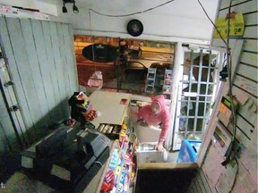 Screen grab of failed smash-and-grab break-in at the Econo gas bar at Holland Avenue and Tyndall Street.