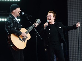 U2's The Edge and Bono perform during Canada 150 celebrations on Parliament Hill on Saturday, July 1, 2017.
