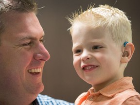 Parker McKay, 3, seen here with his dad Ryan McKay, was diagnosed with hearing loss as a toddler. On Tuesday, the Ontario government announced $3.2 million in funding for the Children’s Hospital of Eastern Ontario’s Infant Hearing Program.