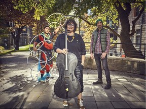 Cris Derksen, centre, plays Tuesday in Chamberfest's Chamberfringe series, with her group that includes Anishinaabe hoop dancer Nimkii Osawamick and drummer Jesse Baird.