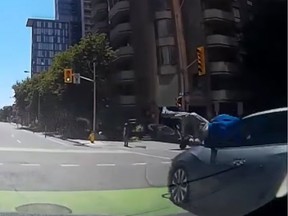 This frame-capture from the dashboard camera video of Nick Fleury shows the moment when a cyclist and driver crashed on Lyon Street on the weekend. (Nick Fleury/YouTube)