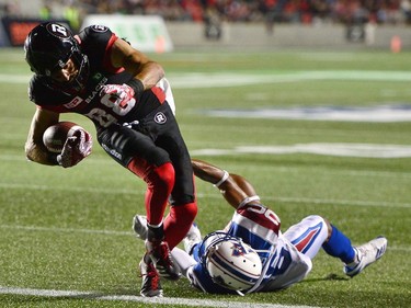 Redblacks slotback Brad Sinopoli (88) scores a touchdown past Alouettes defensive back Tyree Hollins (26) during the third quarter of Wednesday's game.