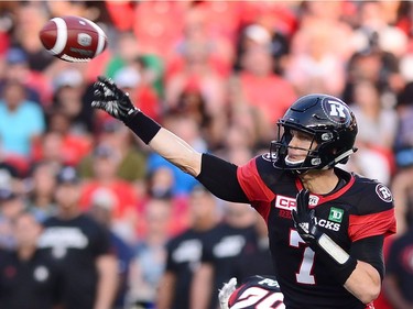 Ottawa Redblacks quarterback Trevor Harris (7) makes a pass during first half CFL football action against the Montreal Alouettes in Ottawa on Wednesday, July 19, 2017.