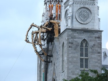 Kumo, the spider from La Machine on Notre Dame Cathedral in Ottawa, July 27, 2017.