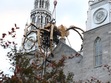 Kumo, the spider from La Machine on Notre Dame Cathedral in Ottawa, July 27, 2017.