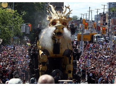 La Machine

A giant mechanical dragon roams the streets of Ottawa starting a four-day urban theatre performance involving a 45-ton half-dragon half-horse that towers 12 metres high. Long Ma, named after a Chinese mythological half-dragon half-horse, is shown on the streets of Ottawa, Friday, July 28, 2017.