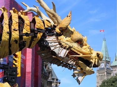 A giant mechanical dragon gets ready to roam the streets of Ottawa in a four-day urban theatre performance involving a 45-ton half-dragon half-horse that towers 12 metres high. Long Ma, named after a Chinese mythological half-dragon half-horse, is shown below Parliament Hill, in Ottawa, Friday, July 28, 2017.