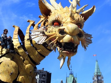 A giant mechanical dragon gets ready to roam the streets of Ottawa in a four-day urban theatre performance involving a 45-ton half-dragon half-horse that towers 12 metres high. Long Ma, named after a Chinese mythological half-dragon half-horse, is shown below Parliament Hill, in Ottawa, Friday, July 28, 2017.