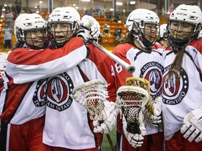 Ontario players celebrate after defeating British Columbia in women's lacrosse action during the North American Indigenous Games in Hagerville, Ontario, on Monday, July 17, 2017. THE CANADIAN PRESS/Chris Young ORG XMIT: CHY112
Chris Young,
