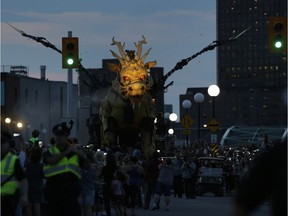 La Machine's mechanical dragon-horse Long Ma walked from Chaudière Falls to meet its giant spider counterpart Kumo at the National War Museum for their grand finale on Sunday. David Kawai/Postmedia