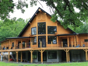 Tony and Lea's custom log home sits on a 10 acre lot. The couple plans to create an organic farming area, an apple orchard and a man-made pond in the next few years.