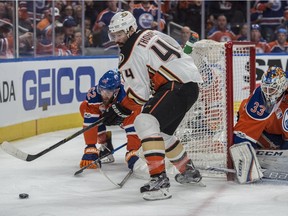Nate Thompson, middle, battles for the Anaheim Ducks in their 2017 playoff series against the Edmonton Oilers. Ed Kaiser/Postmedia