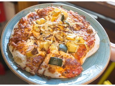 The restaurant features inspirations such as this pizza by head chef Angela Baldwin.