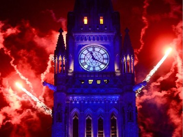 Fireworks light up behind the Peace Tower during the evening ceremonies of Canada's 150th anniversary of Confederation, in Ottawa on Saturday, July 1, 2017.
