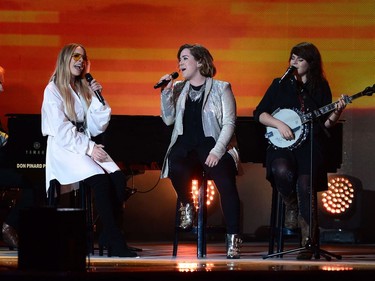 From left to right, Marie Mai, Serena Ryder and Lisa Leblanc perform during the evening ceremonies of Canada's 150th anniversary of Confederation, in Ottawa on Saturday, July 1, 2017.