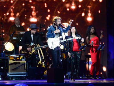 Louis-Jean Cormier performs during the evening ceremonies of Canada's 150th anniversary of Confederation, in Ottawa on Saturday, July 1, 2017.