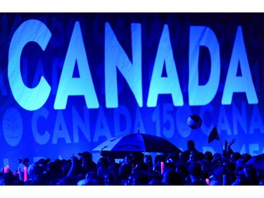 Guests await the evening ceremonies for Canada's 150th anniversary of Confederation, in Ottawa on Saturday, July 1, 2017.